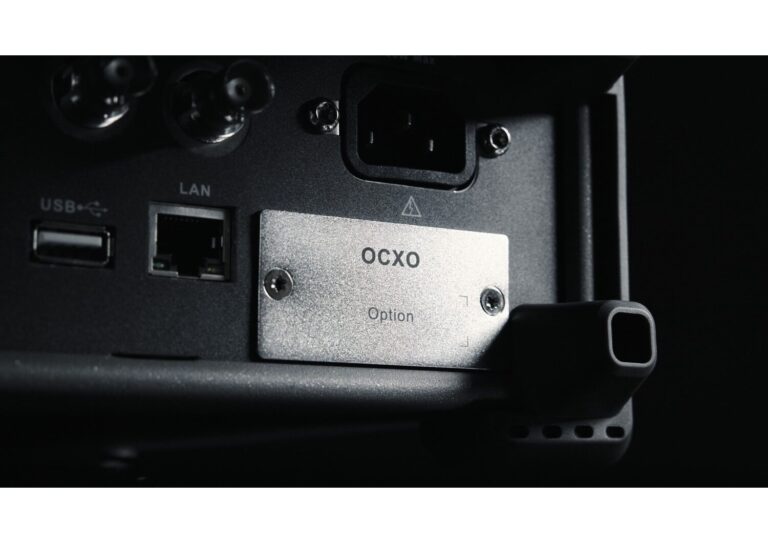 Add the 10M_OCXO_L precision reference for improved frequency accuracy and stability, including ±1 ppb temperature stability.